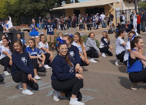 students performing in quad
